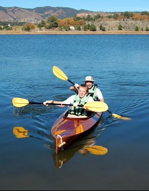 Brian K. and a friend paddling on Colorado's Monument Lake in a Wood Duck Double kayak. 