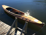 A Wood Duck Double kayak built by Chuck J. floating at the dock Thumbnail