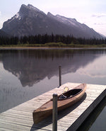 Ian S.'s Wood Duck Double kayak on a dock, awaiting its maiden voyage at Vermilion Lakes in Alberta, Canada. Thumbnail