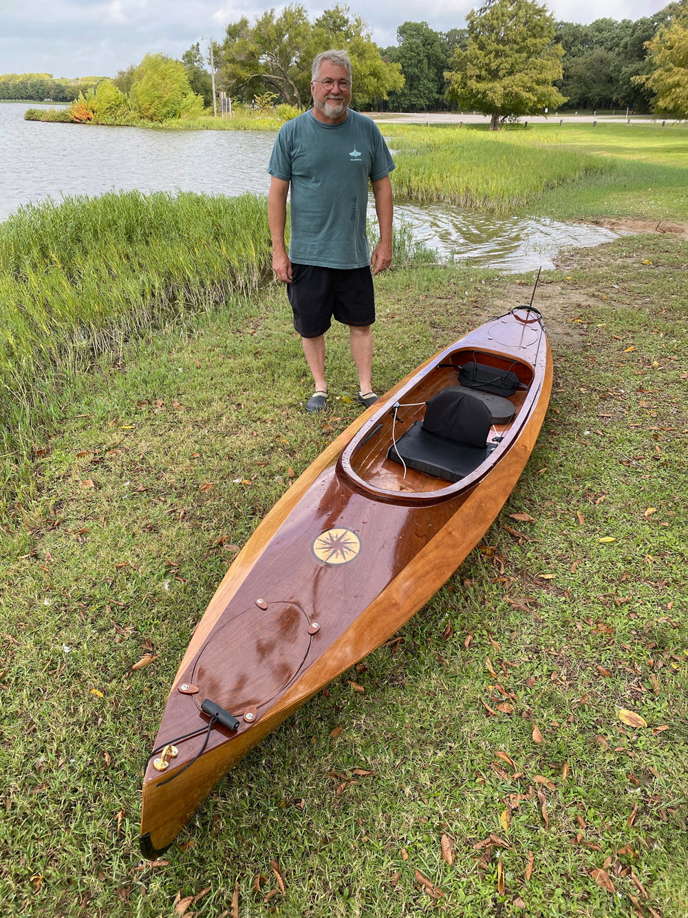 Kevin B. built this Wood Duck Double kayak in a class. He displays his craftsmanship here.