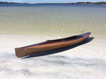 Brett D. built this Wood Duck Double kayak, PERILOUS 2, that is beached at Spectre Island, Florida. Thumbnail