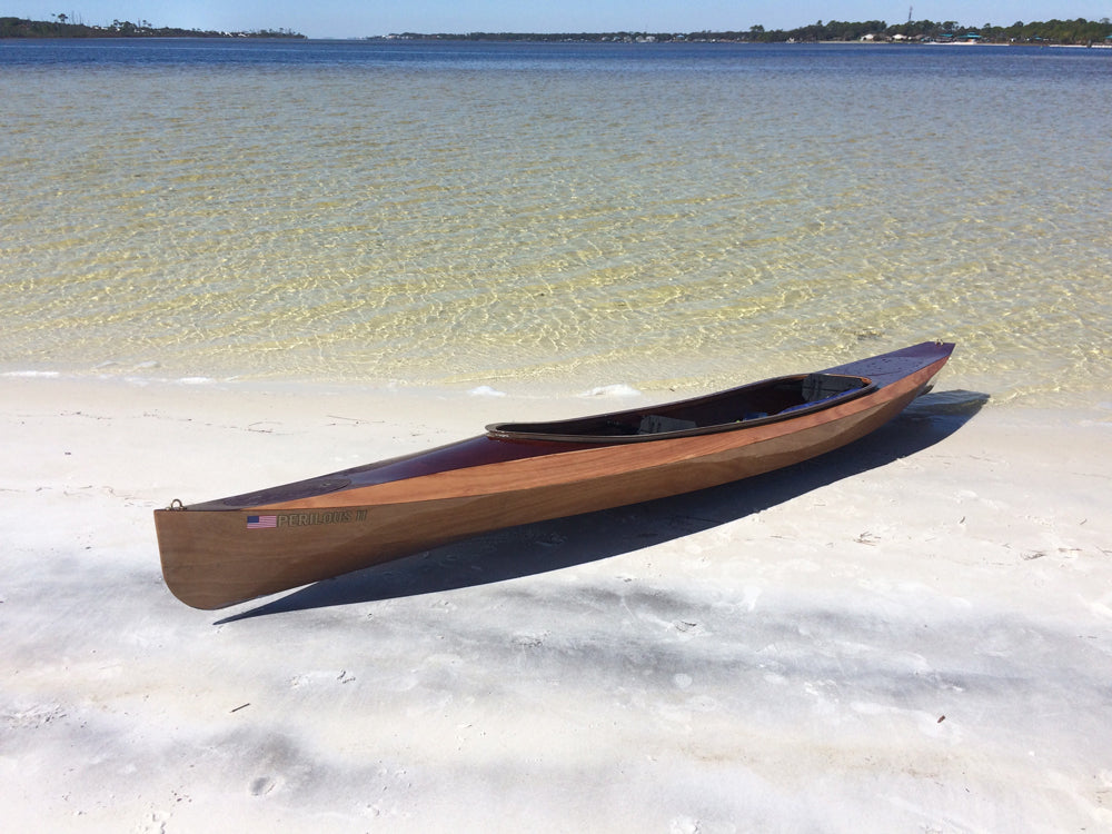 Brett D. built this Wood Duck Double kayak, PERILOUS 2, that is beached at Spectre Island, Florida.