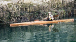 Nick Schade paddling his Aleutesque kayak along the Maine coastline. Thumbnail