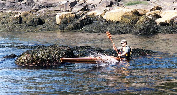 Designer Nick Schade paddling his Aleutesque kayak off the Maine coast.