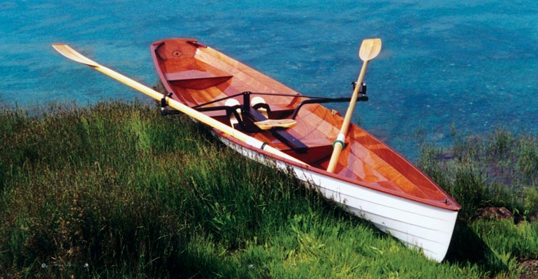 View of the drop-in rowing rig and oars in their sockets on an Annapolis Wherry.