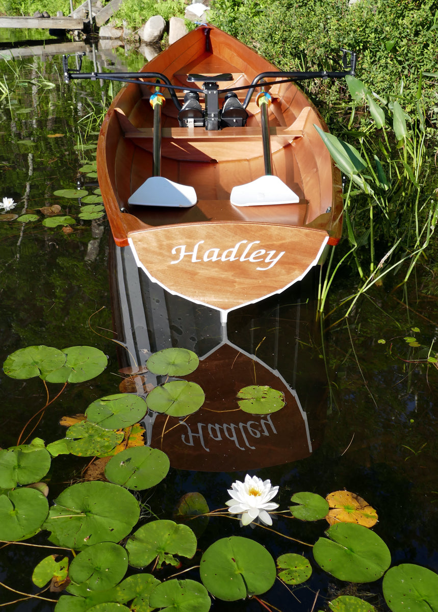 Annapolis Wherry named Hadley built by Jim R. surrounded by water lilies on an Adirondack lake