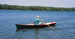 Rowing an Annapolis Wherry on a wooded lake Thumbnail