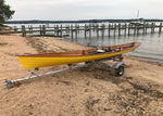 A yellow Annapolis Wherry on a Trailex SUT 250 SCLC on a beach in Maryland Thumbnail