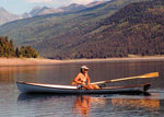 Man rowing an Annapolis Wherry on a mountain lake Thumbnail
