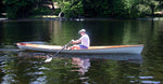 Rowing an Annapolis Wherry on a scenic lake Thumbnail
