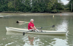 Rowing a white Annapolis Wherry built by Ron S. Thumbnail
