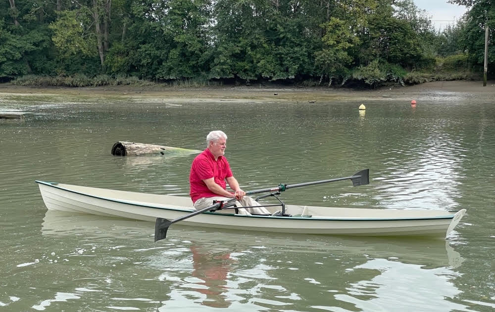 Rowing a white Annapolis Wherry built by Ron S.
