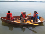 Three people enjoying an outing in a Bevin's Skiff wooden boat kit Thumbnail