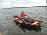 A man rowing a Bevin's Skiff Thumbnail