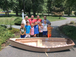 Thomas R. and his family with their Bevin's Skiff Thumbnail