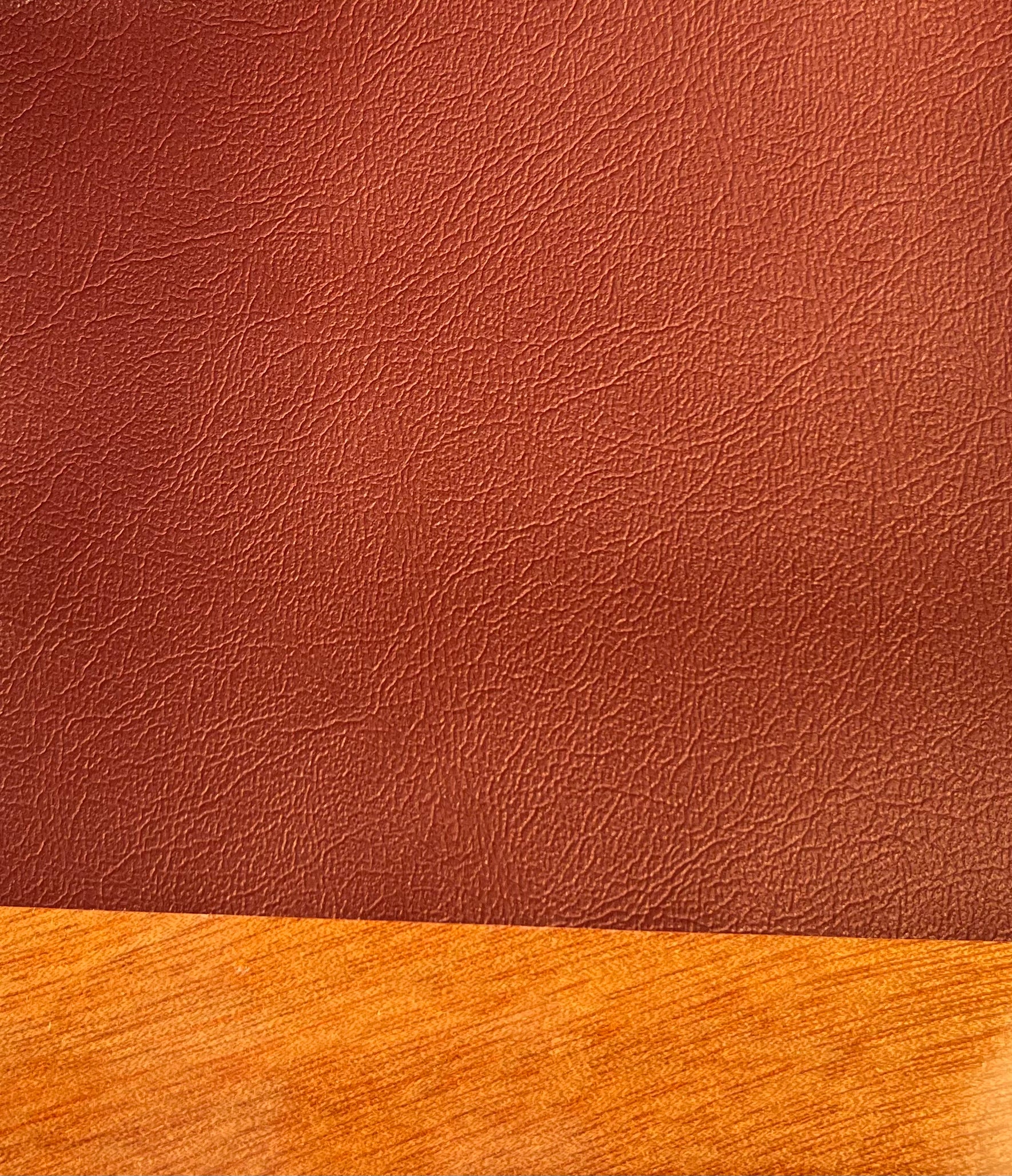 Burgundy vinyl material swatch for Rhode Runner seat cushions