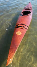 A Chesapeake 16LT wooden kayak with a compass rose onlay on the sapele deck, built by Eric W. Thumbnail