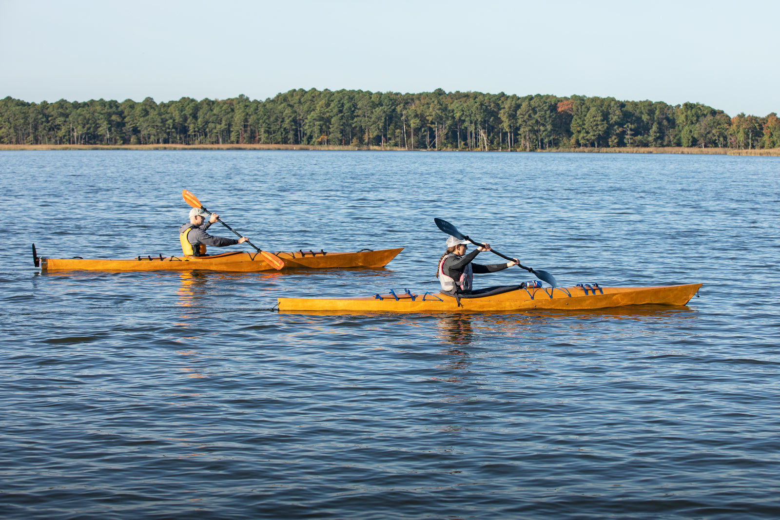 A woman paddling a Chesapeake 16LT alongside a man in a Chesapeake 17
