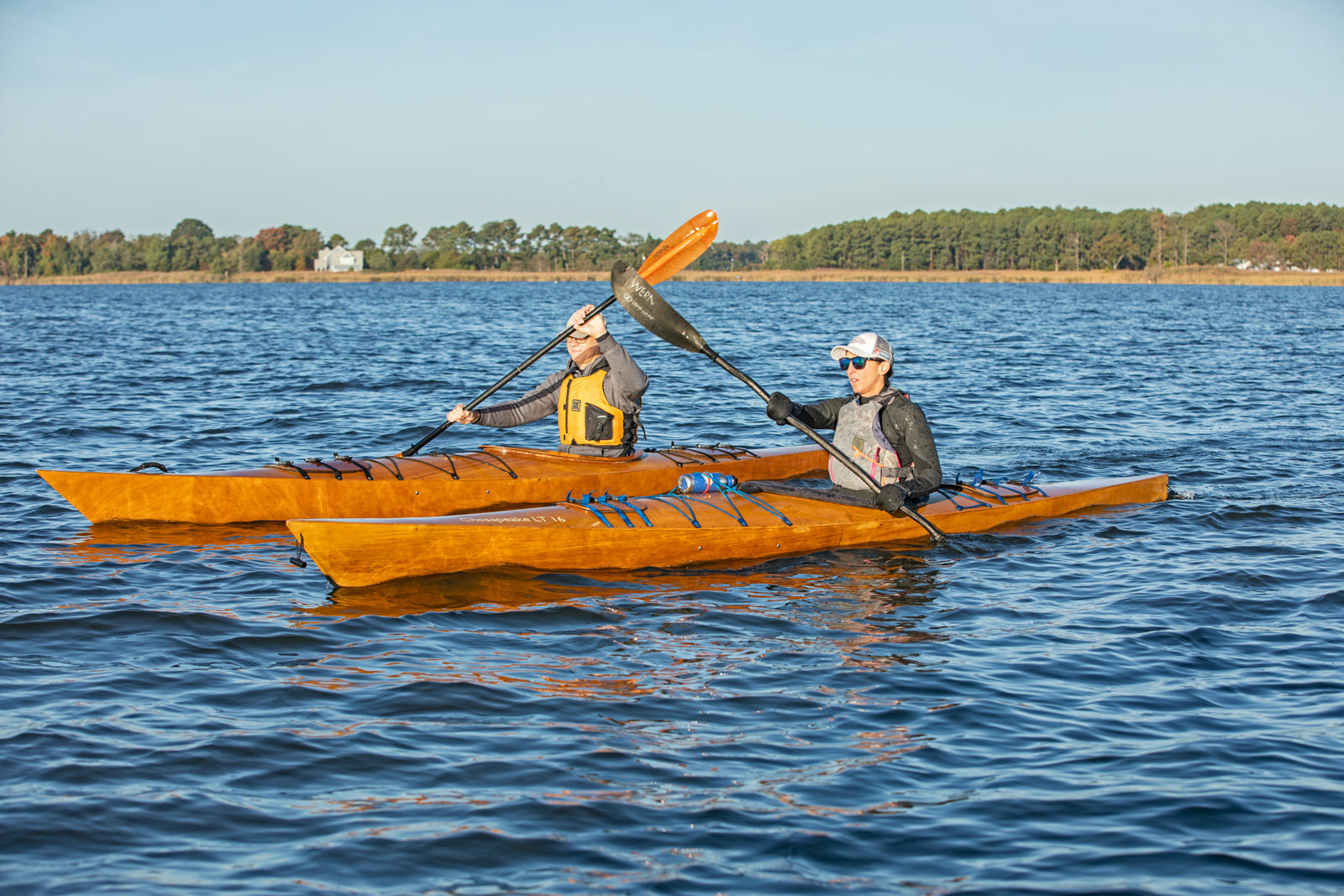 A woman paddling a Chesapeake 16LT alongside a man in a Chesapeake 17
