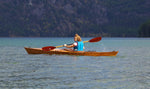 A woman paddling a Chesapeake 14 wooden kayak built by David S.
 Thumbnail