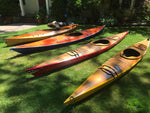 A lineup of wooden kayaks by Tony O., Cape Elizabeth, ME: Wood Duck 14, Shearwater Sport, Chesapeake 14, and Chesapeake 16LT (left to right) Thumbnail