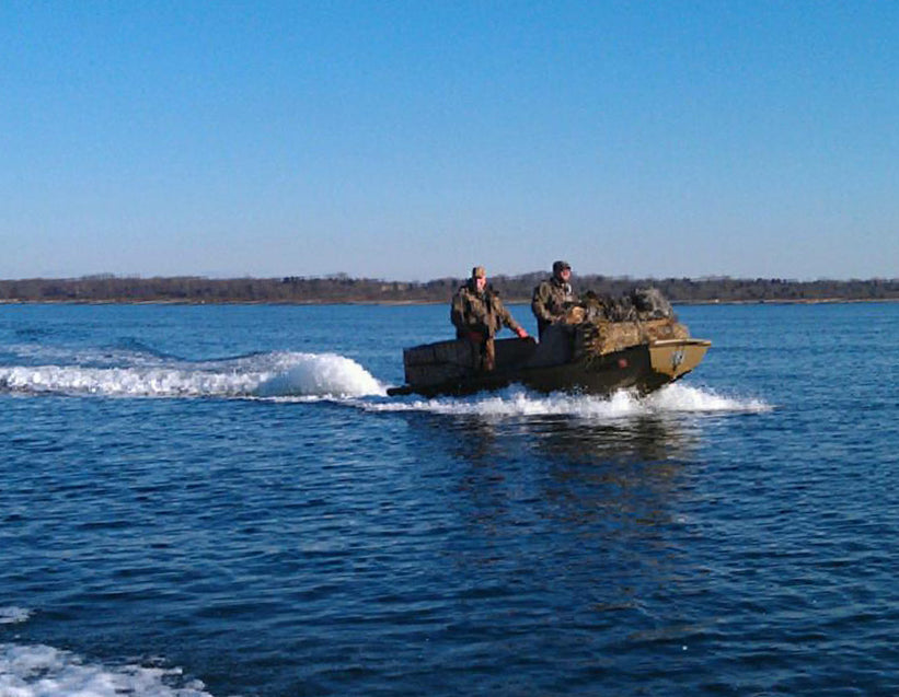 The foredeck of the Cackler 14 is a great place to store your decoy bags.