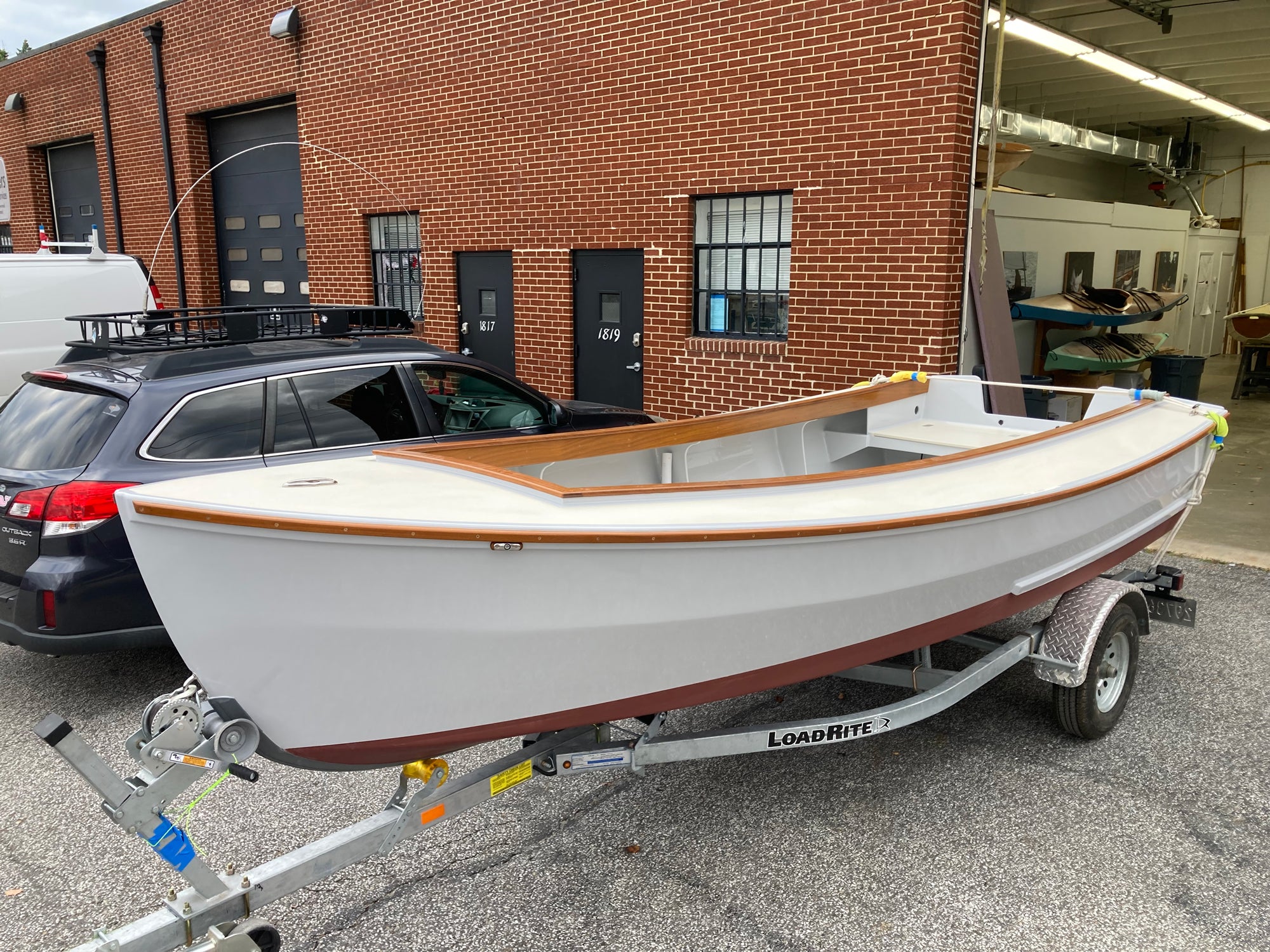 Candlefish 16 casting deck in front of the Chesapeake Light Craft shop