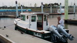 Dipper 19 with twin outboards, docked Thumbnail