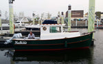 Dipper 19 with twin outboards, docked. Thumbnail