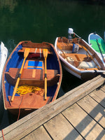 Eastport Nesting Pram on left is tied up next to an Eastport Pram on the right. Thumbnail