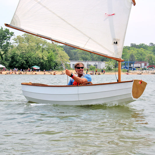Eastport Nesting Pram sailing during CLC's OkoumeFest in 2015.