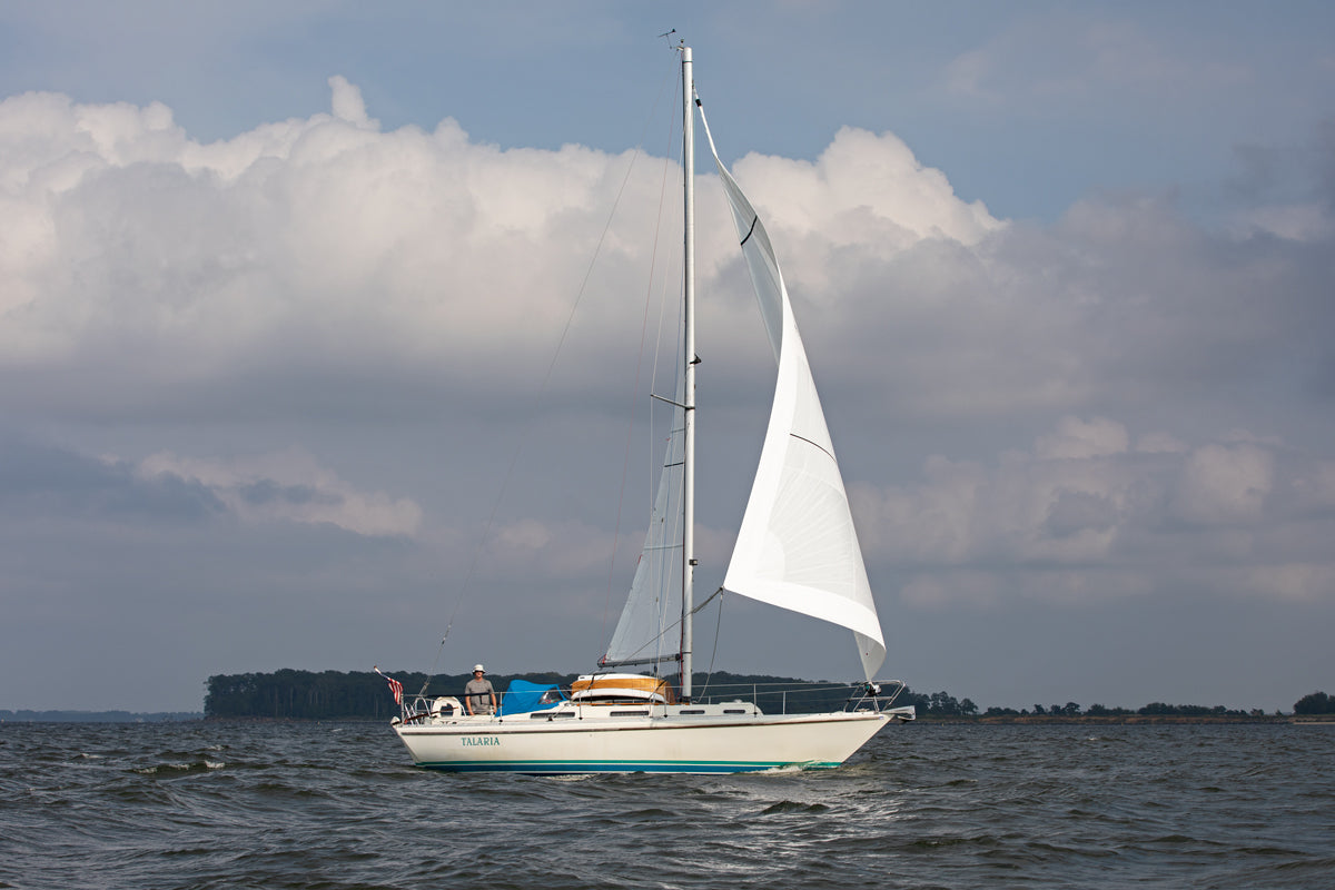The cabin top of TALARIA holds an Eastport Ultralight Dinghy.