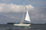 The cabin top of TALARIA holds an Eastport Ultralight Dinghy. Thumbnail