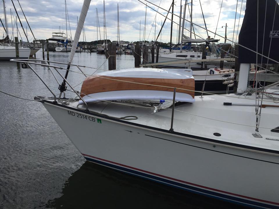 Eastport Ultralight Dinghy stows neatly on foredeck of a C&C 27.