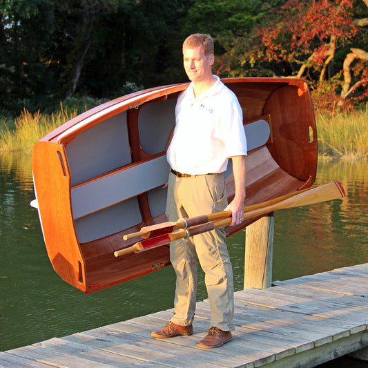 Eastport Ultralight Dinghy is light enough to carry over your shoulder.