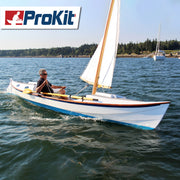 Lead Image for the Faering Cruiser Prokit, Matthew M. of WoodenBoat magazine at the helm.