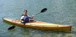 A woman enjoying a paddle in a Great Auk 14 sea kayak. Thumbnail