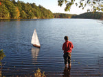 Independence R/C Sailboat model sailing in a lake.  Thumbnail