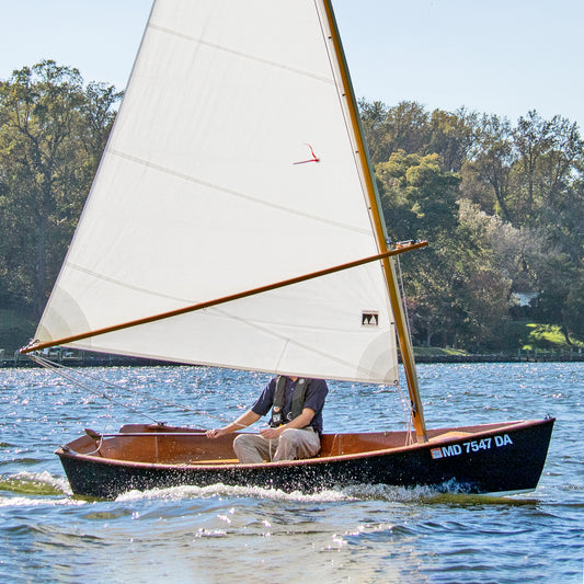 Jimmy Skiff II Wooden Boat Kit sailing solo on the Severn River, MD