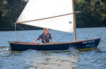 John Harris sailing the Jimmy Skiff.  Thumbnail