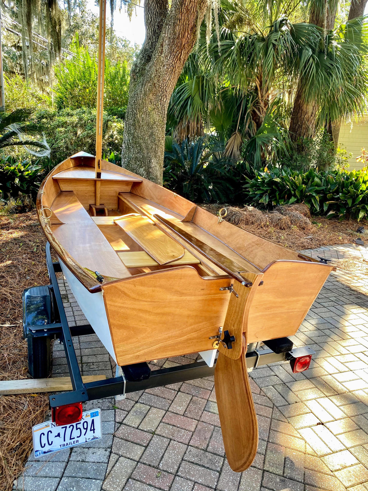Jimmy Skiff stern and interior view on trailer in a driveway.