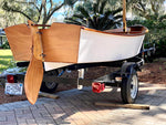 White hulled Jimmy Skiff on a trailer.  Thumbnail