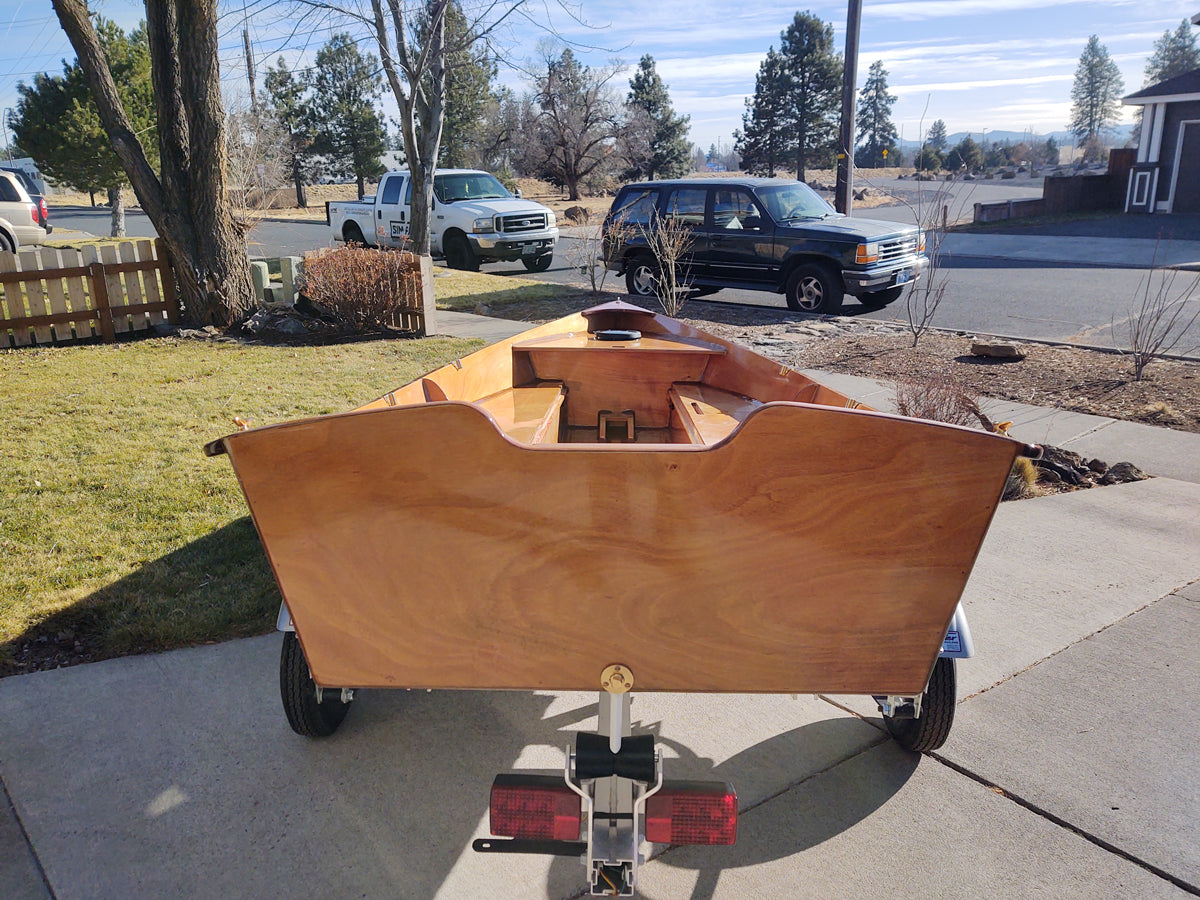 Stern view of a Jimmy Skiff on a trailer. 
