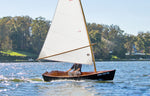 John Harris sailing the Jimmy Skiff.  Thumbnail