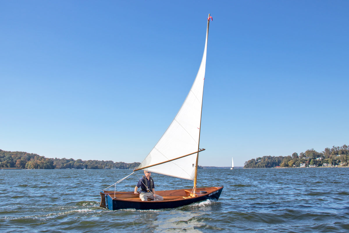 John Harris sailing a Jimmy Skiff on the Severn River in Annapolis, MD. 