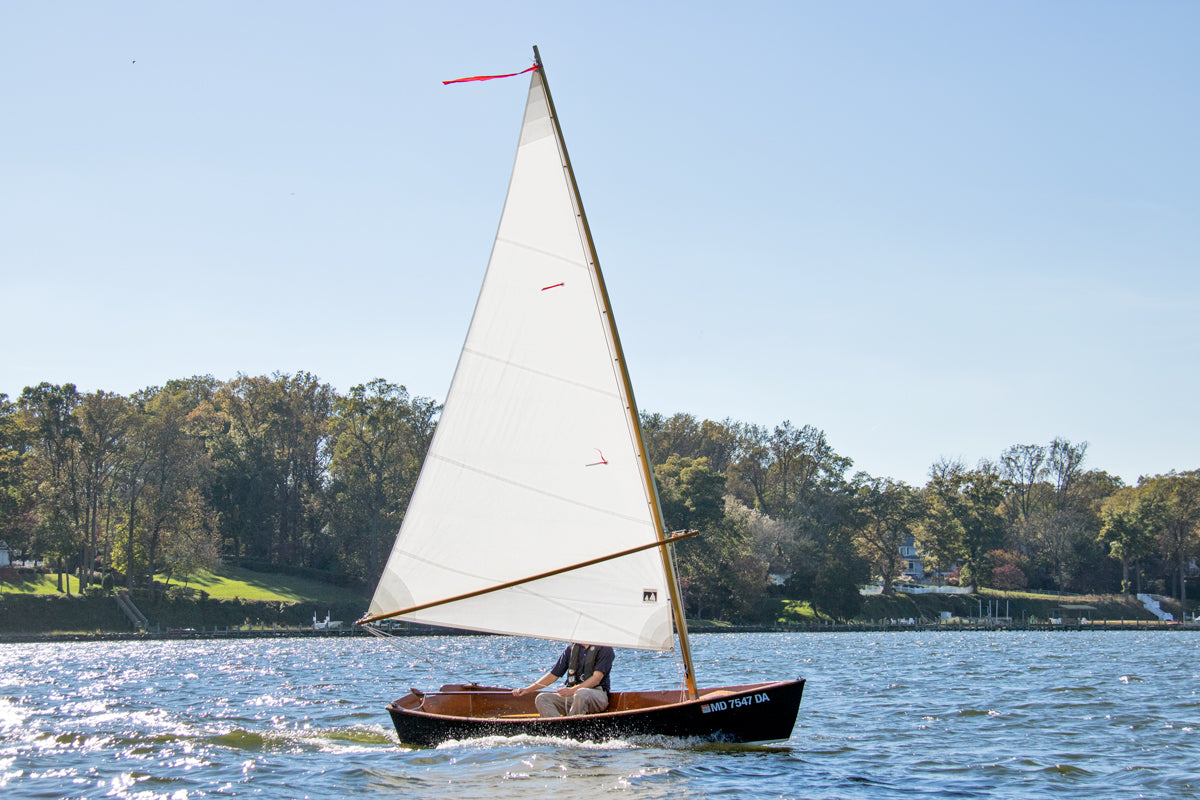 John Harris sailing a Jimmy Skiff on the Severn River in Annapolis, MD. 
