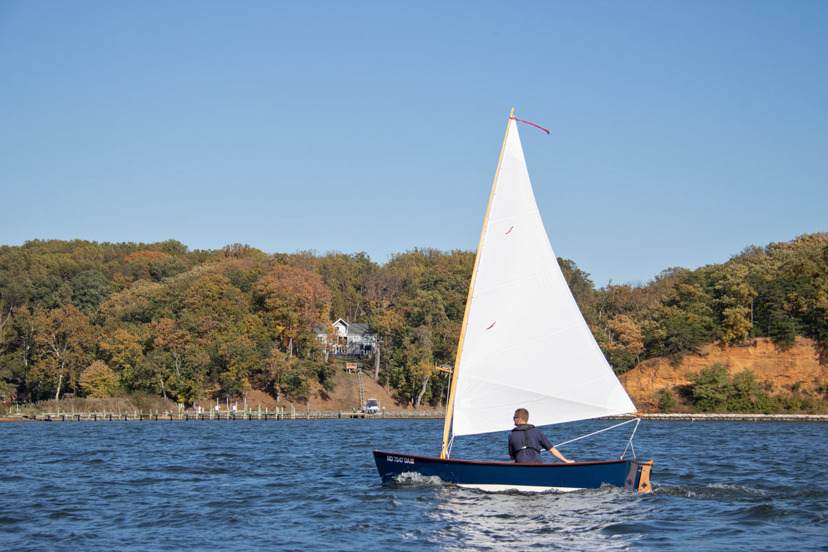 John Harris sailing a Jimmy Skiff on the Severn River in Annapolis, MD. 
