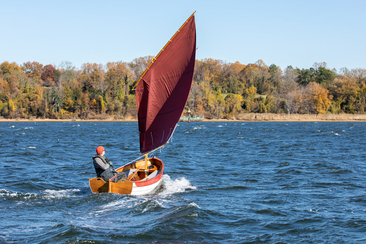 Lake Union Swift with the lug rig sailing on the Severn River in Maryland