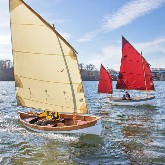 Lighthouse Tender Peapods, balanced lug (foreground) and yawl rig (background) sailing the Severn River, Annapolis, MD 