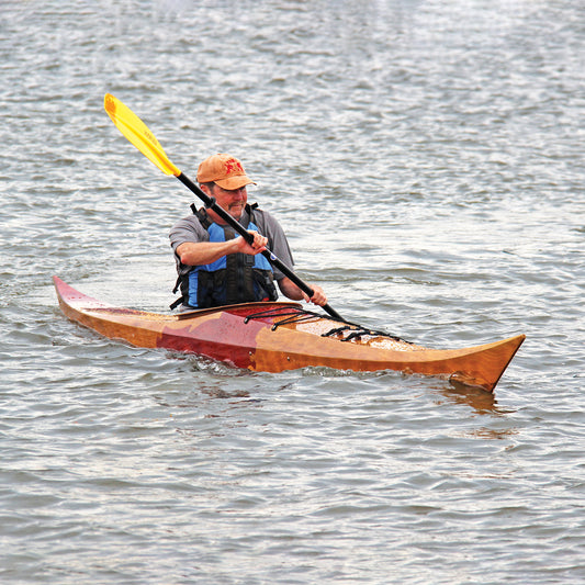 Night Heron SG being paddled by a customer at a Yonkers, NY Demo day.